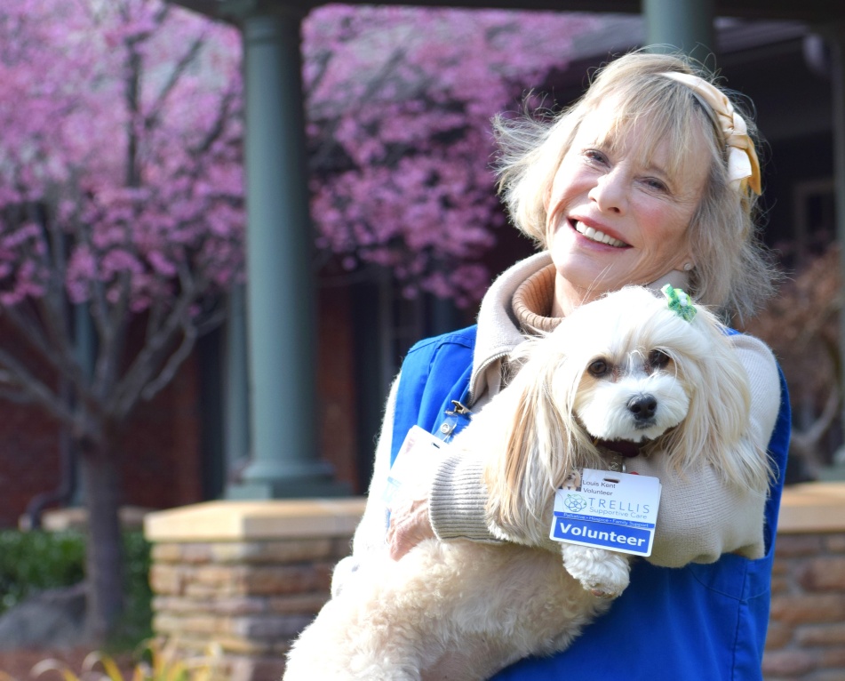 volunteer with her therapy dog to make patient visits