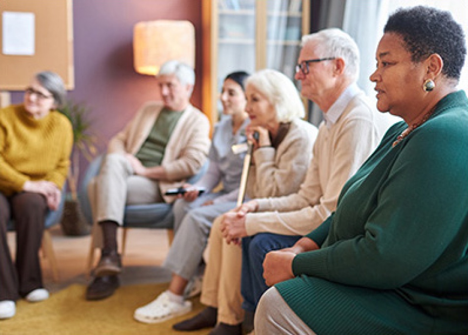 a group participating in grief counseling